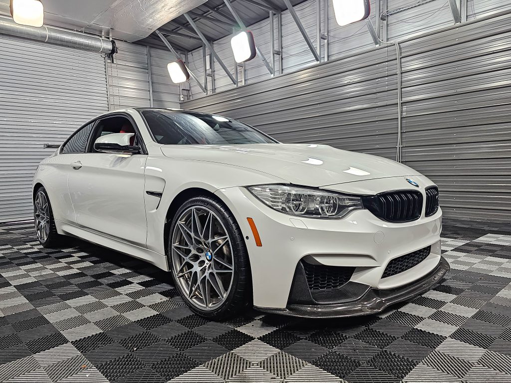White 2016 BMW M4 Luxury Coupe with Competition Pkg