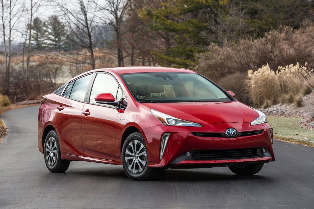 Red 2022 Toyota Prius parked on the road