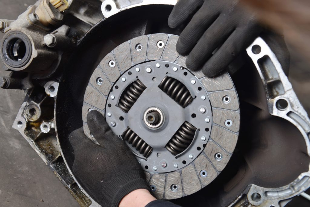 person repairing the clutch