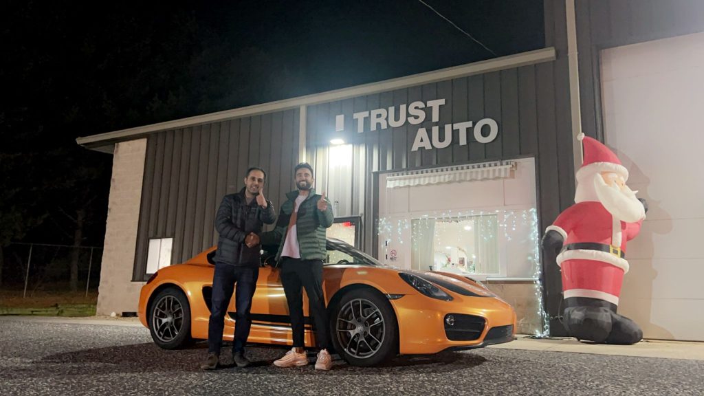Orange Porsche Trust Auto