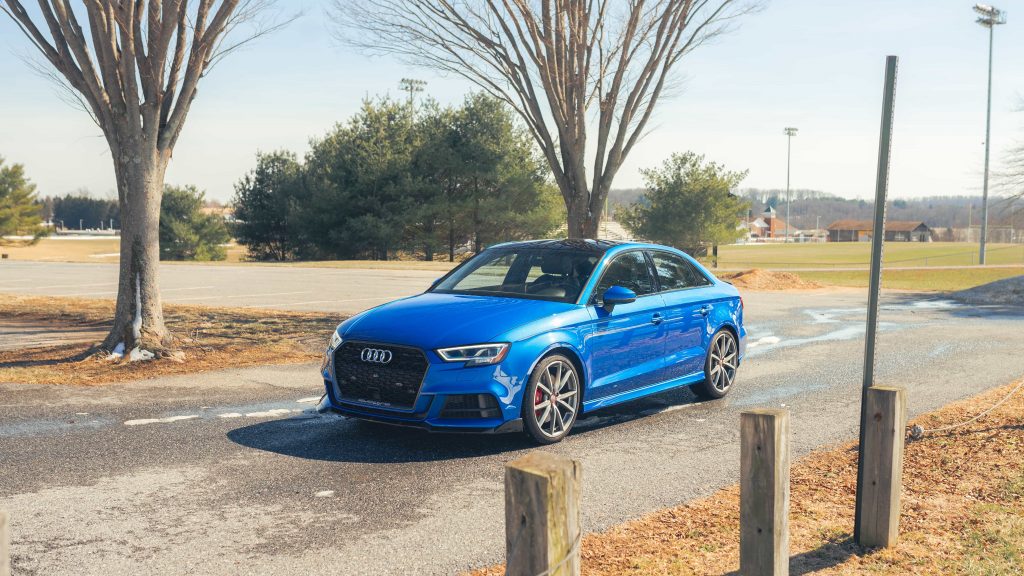 Blue Audi Front View Image parked on the road